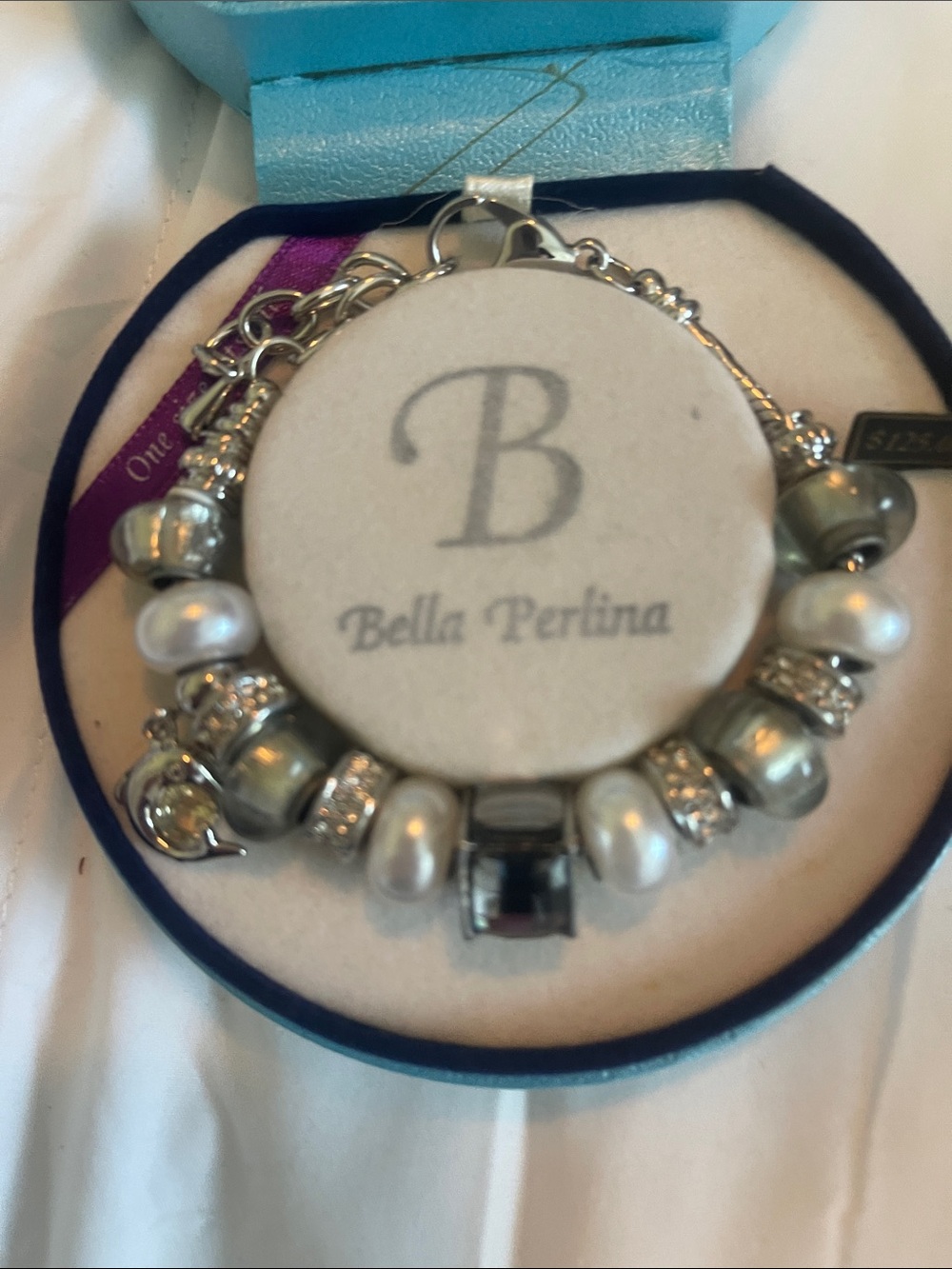 Bella Perlina bead bracelet with dolphin charm.